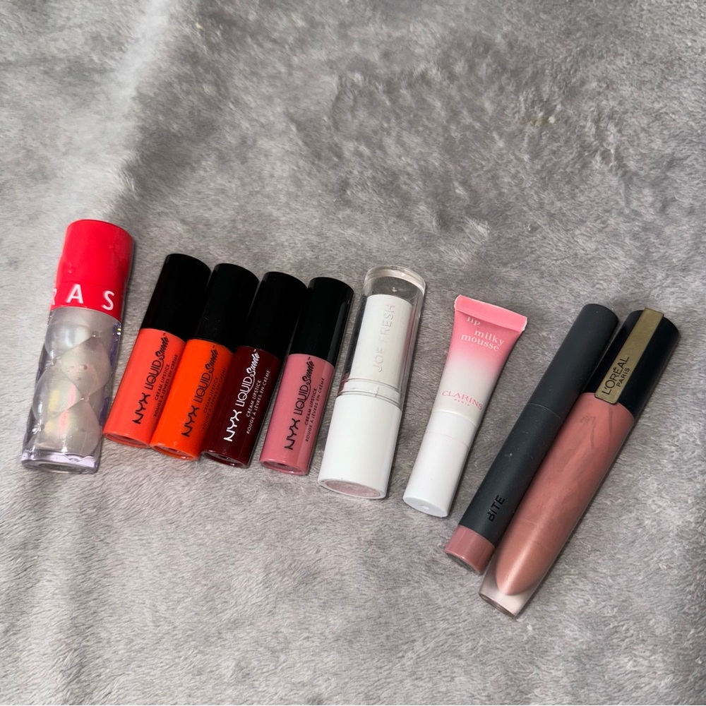 9 lipsticks/ NYX Liquid Suede cream/ Sephora Plump Lip Gloss/ LβOrΓ©al, Clarins